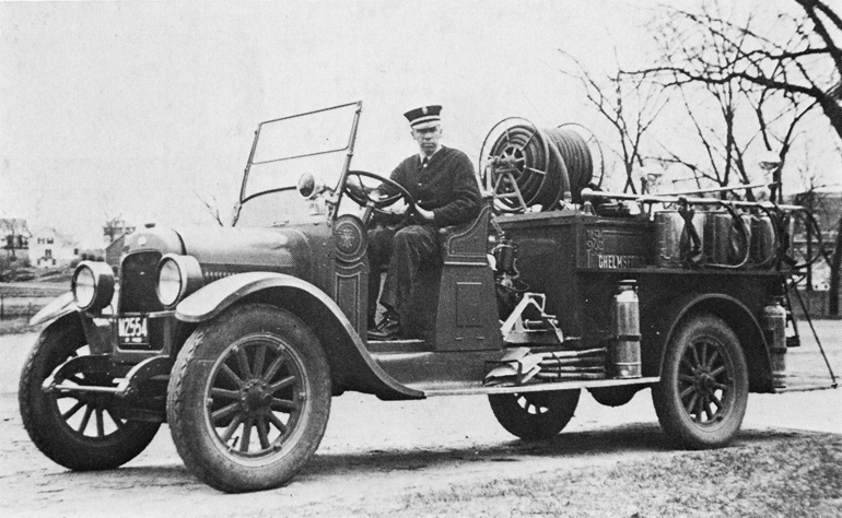 Gilbert H. Perham in Federal Knight Forest Service Truck