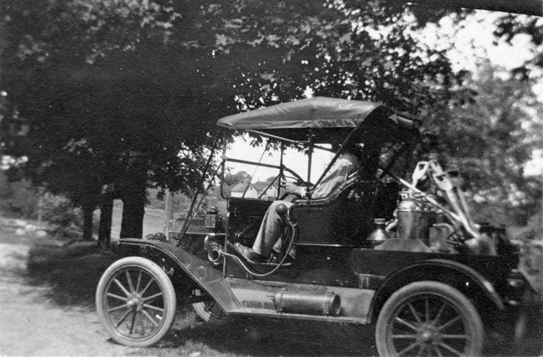 As the newly appointed Forest Fire Warden in 1912 Arnold C. Perham used this modified
		Ford Model T Roadster to transport equipment to fires