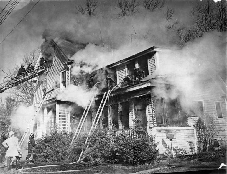 Fire on Princeton Street in 1965, Chief Ried is in the white coat at left