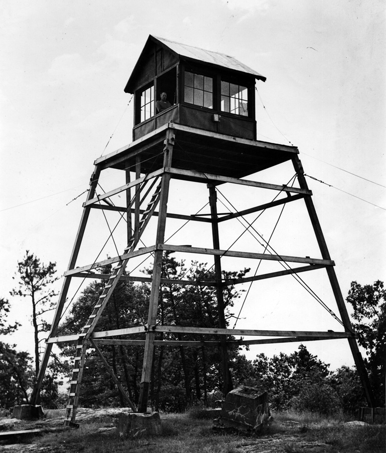 The 1938 Hurricane destroyed the 1918 Fire Tower on Robins Hill. This temporary tower 
was constructed until a new steel tower the same height as the older one could be built