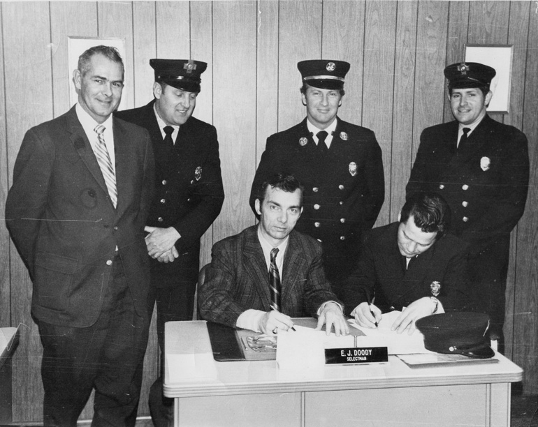 1971 Signing of the Union Contract. From left to right: 
Chief Frederick Reid, Alvin Wetmore, Selectman E.J. Doody,
Capt. Allen Mello, James Cutter, Ronald Sawicki