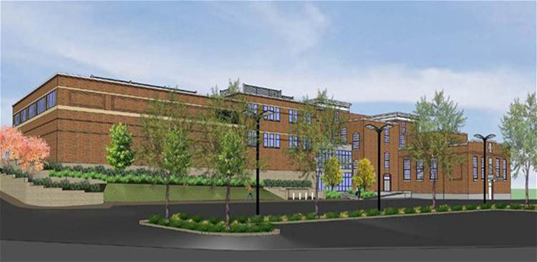 View of new Center Fire Station from Chelmsford Street side showing new parking area for Town Offices