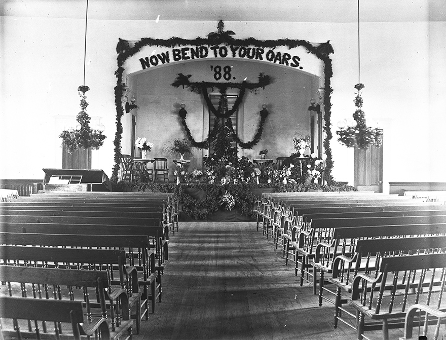 Town Hall stage decorated for high school graduation